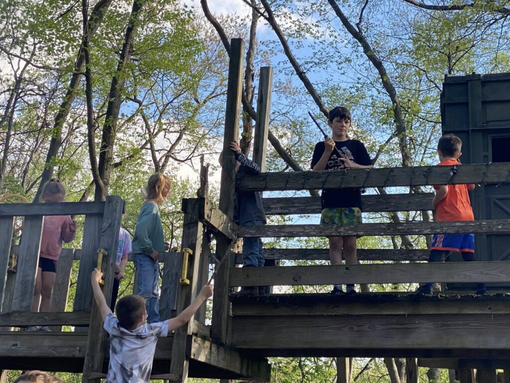 5. A Playground Designed for Imagination ✈️
We’ve made sure that the youngest members of your family have an incredible time too. Our custom playground features a unique seven-seat airplane seesaw and a fort house. It is a safe, gated space where children can play freely while you relax on the cabin porch. This focus on family needs is why our Glamping Cabins are so highly rated by parents from DC, VA, and PA.