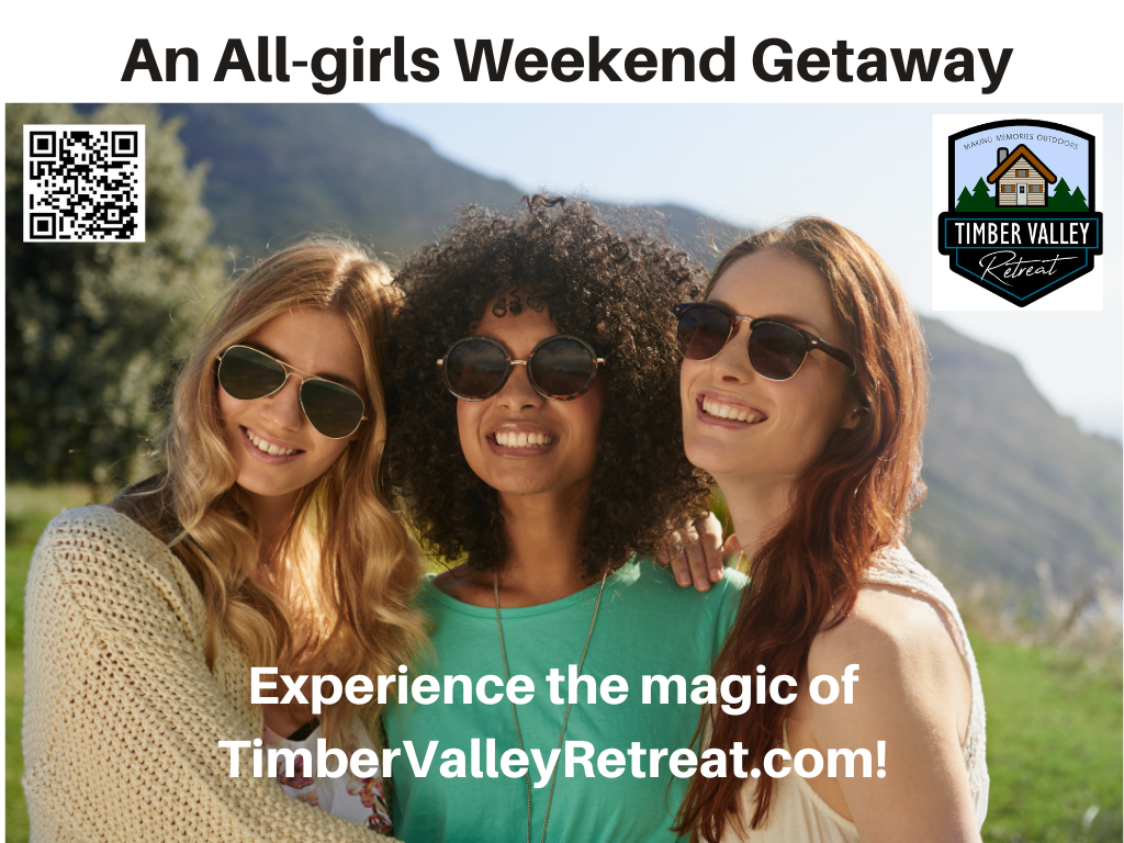 Group of women relaxing on a cabin porch enjoying a girls' weekend glamping getaway at Timber Valley Retreat