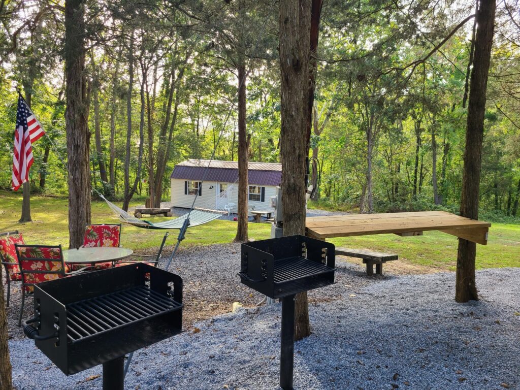 he Summer Kitchen: Gourmet Living in the Great Outdoors
One of the highlights of Timber Valley Retreat is our “Summer Kitchen.” We believe that a private glamping escape should still include a hot meal and a cold drink. 🥩🥗

The kitchen area is fully equipped with:

Two full-sized refrigerators to store all your group’s supplies.
A stove and oven for preparing family feasts.
A microwave and toaster for quick snacks.
Hot and cold running water for easy cleanup.
Outside, you’ll find charcoal grills ready for a classic barbecue. There is nothing quite like the smell of a cookout drifting through the trees as the sun begins to set. 🍔🔥