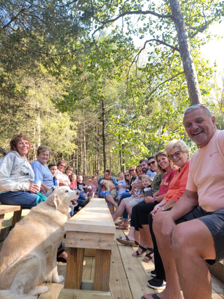 4. The Canopy of Trees: Descending to the Potomac 🌳🌊
As the Trailblazer begins its descent toward the water, the environment undergoes a dramatic transformation. 🌳 We leave the open, sun-drenched fields and enter a lush, green canopy of ancient trees. The temperature often drops a few degrees here, providing a refreshing break on a warm Maryland afternoon. 🌬️🌳

This section of the ride follows the historic C&O Canal and the towpath. 🌊 The trees here—oaks, maples, and sycamores—have stood for decades, their branches intertwining above the road to create a natural tunnel. It’s a favorite spot for our photographers, as the sunlight filters through the leaves in "god rays," illuminating the dust motes and creating a magical, forest-like atmosphere. 📸✨