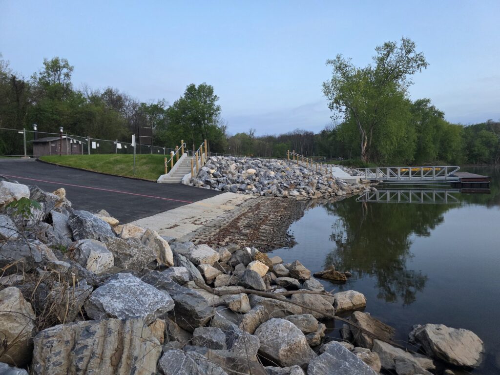 4. Advanced Shoreline Four Locks Boat Ramp Improvements 🪨
The power of the Potomac is not to be underestimated. To protect these Four Locks Boat Ramp Improvements, the NPS installed heavy-duty riprap armoring along the riverbanks. By using large, durable dumped stone, the project protects the new concrete work from the constant pressure of the current and seasonal flooding. 🌊

This "armoring" ensures that your favorite spot for Potomac River Boating Maryland will remain intact for decades to come. It prevents the type of "undermining" that caused the original 1960s ramp to fail, making these Four Locks Boat Ramp Improvements a very smart long-term investment.