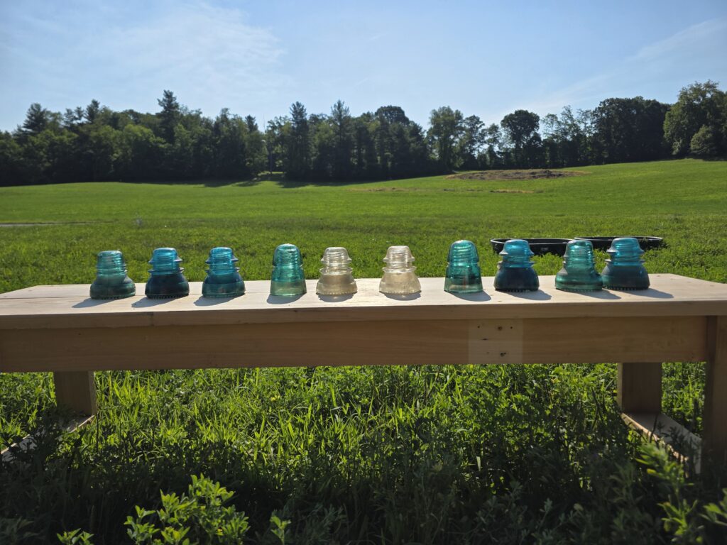 Train Watching Maryland. The different style, types and colors of insulators that the railroad use for communications back in the day before cell phones and text messages and GPS tracking.