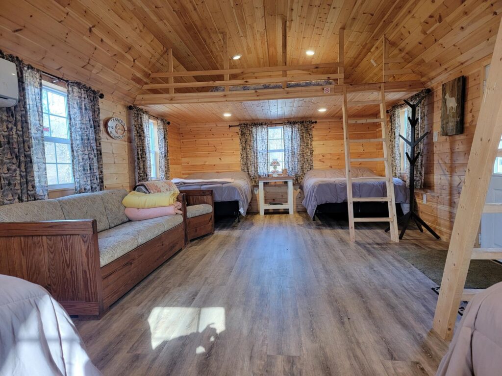 Private Group Cabin Retreat Maryland. Inside view of Tanner's Bunkhouse with two lofts and plenty of comfort at Timber Valley Retreat in Clear Spring Maryland, 21722.