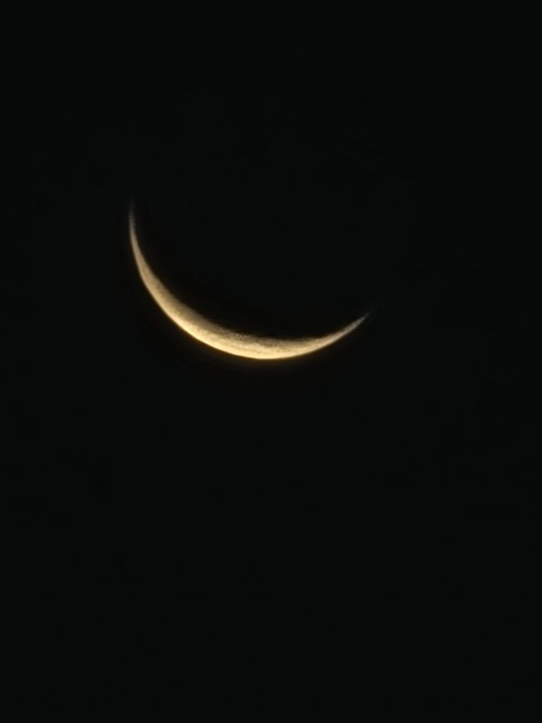 Moon Watching Western Maryland with a crescent moon glowing in the night sky at Timber Valley Retreat