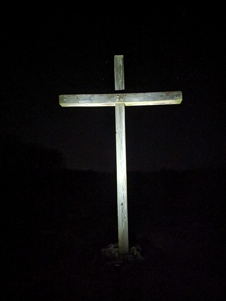 The Cross on the Hill illuminated at night at Timber Valley Retreat, an Exclusive Private Cabin Retreat in Washington County, Maryland near Washington DC, Northern Virginia, Pennsylvania, West Virginia, and Maryland's Eastern Shore.