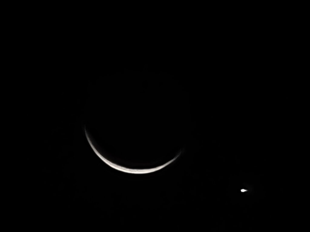 Moon Watching Western Maryland with a crescent moon and bright celestial object in the night sky at Timber Valley Retreat
