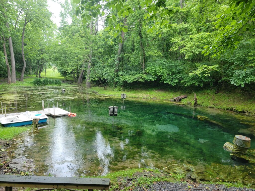 Spring-fed pond during a Morning Cabin Getaway Maryland at Timber Valley Retreat, where guests enjoy peaceful reflections, wildlife, and the natural beauty of Western Maryland.